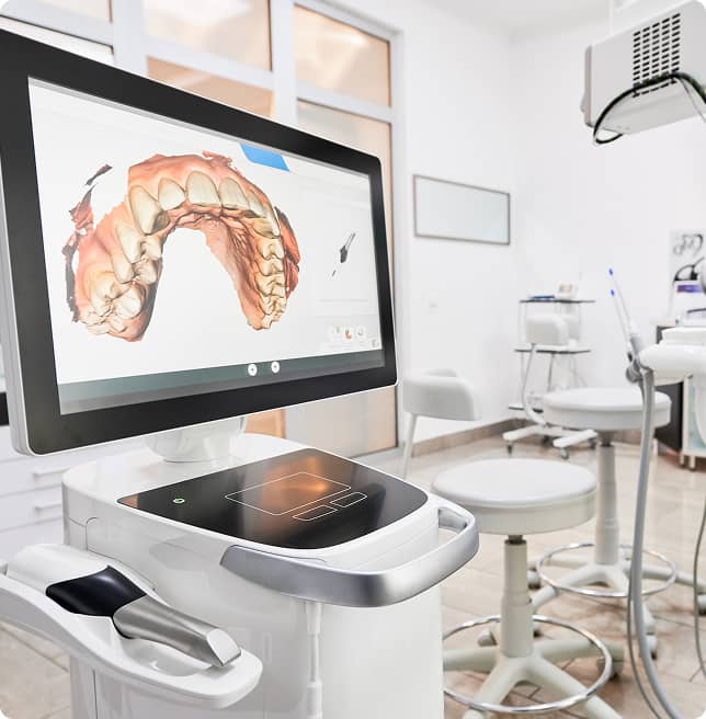 patient's oral exam on screen inside office