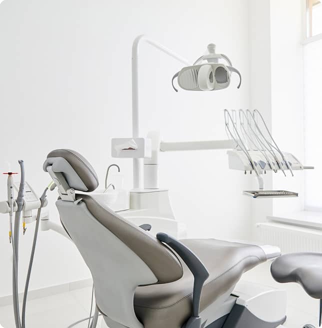 empty patient chair in dentist office