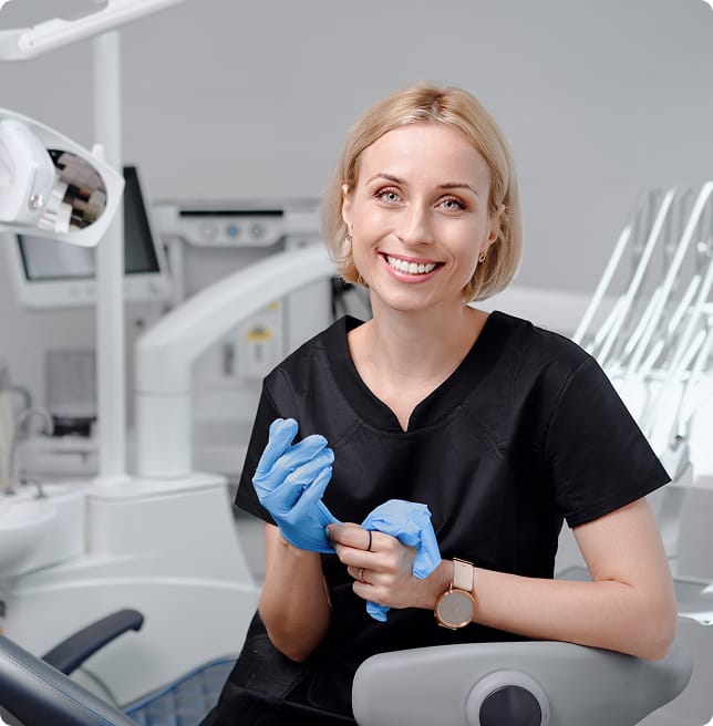 dentist removing gloves