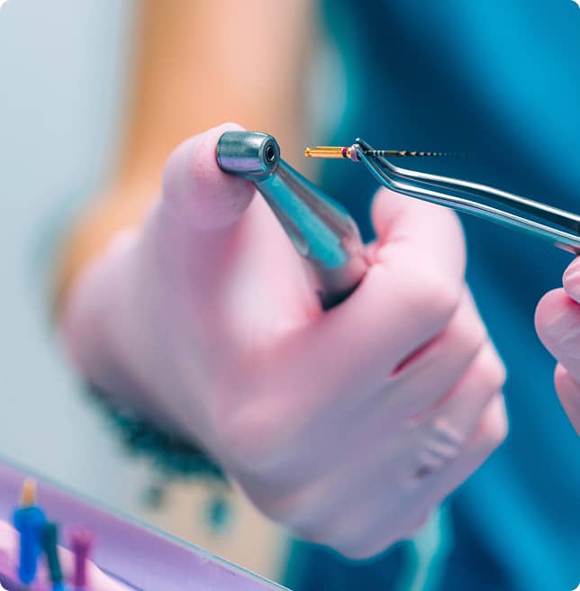 woman using dental tools