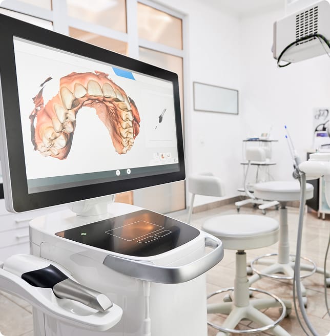 patient's oral exam on screen inside office
