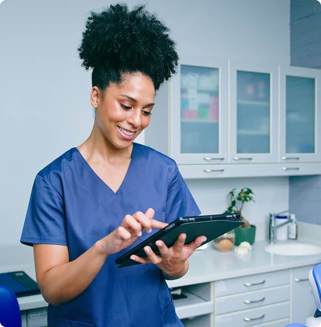 dentist using ipad