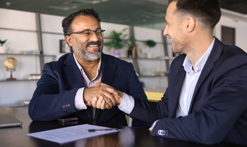 two business men shaking hands