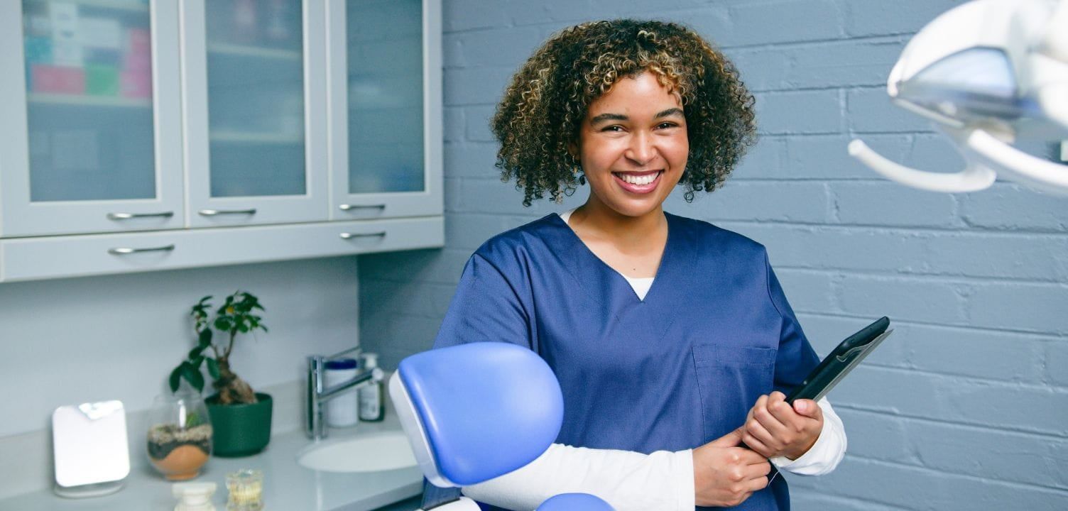 dental hygienist with clipboard