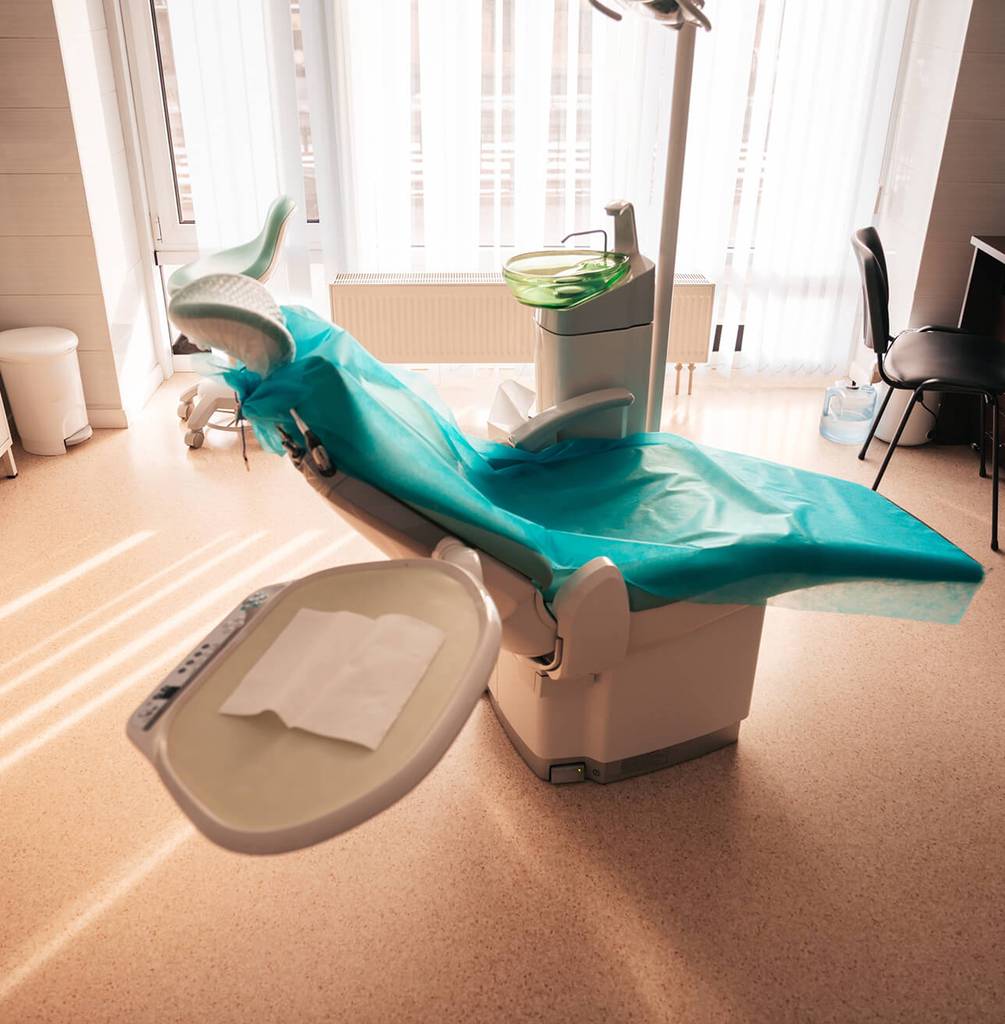 empty patient chair at dental office