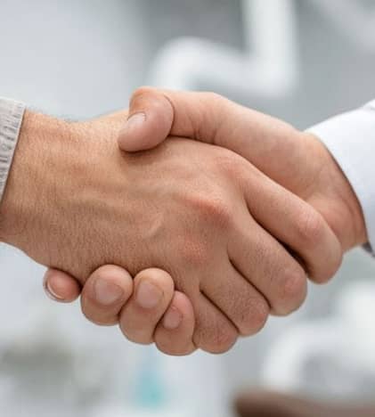 two men shaking hands
