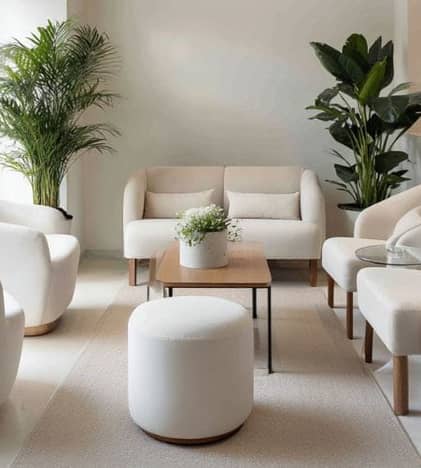 white chairs and love seat inside office