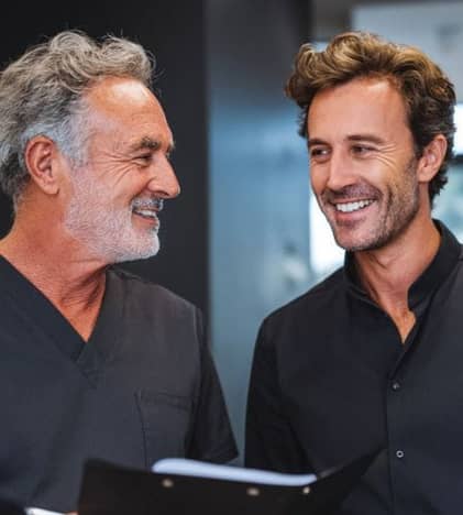 two men reviewing paperwork