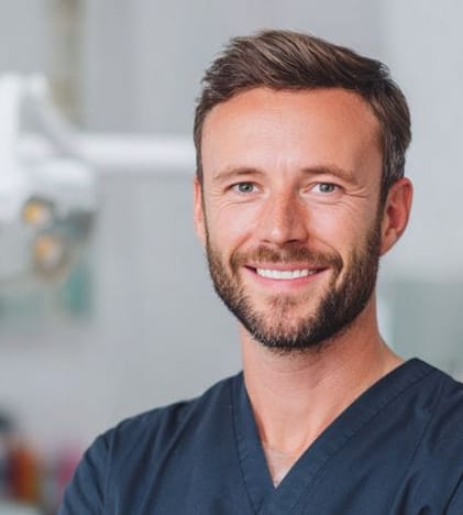 dentist smiling inside office