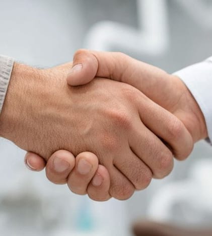two men shaking hands