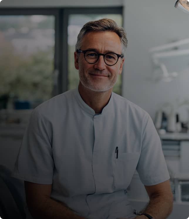 dentist inside office smiling