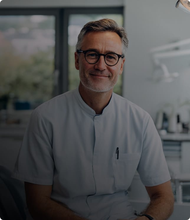 dentist inside office smiling
